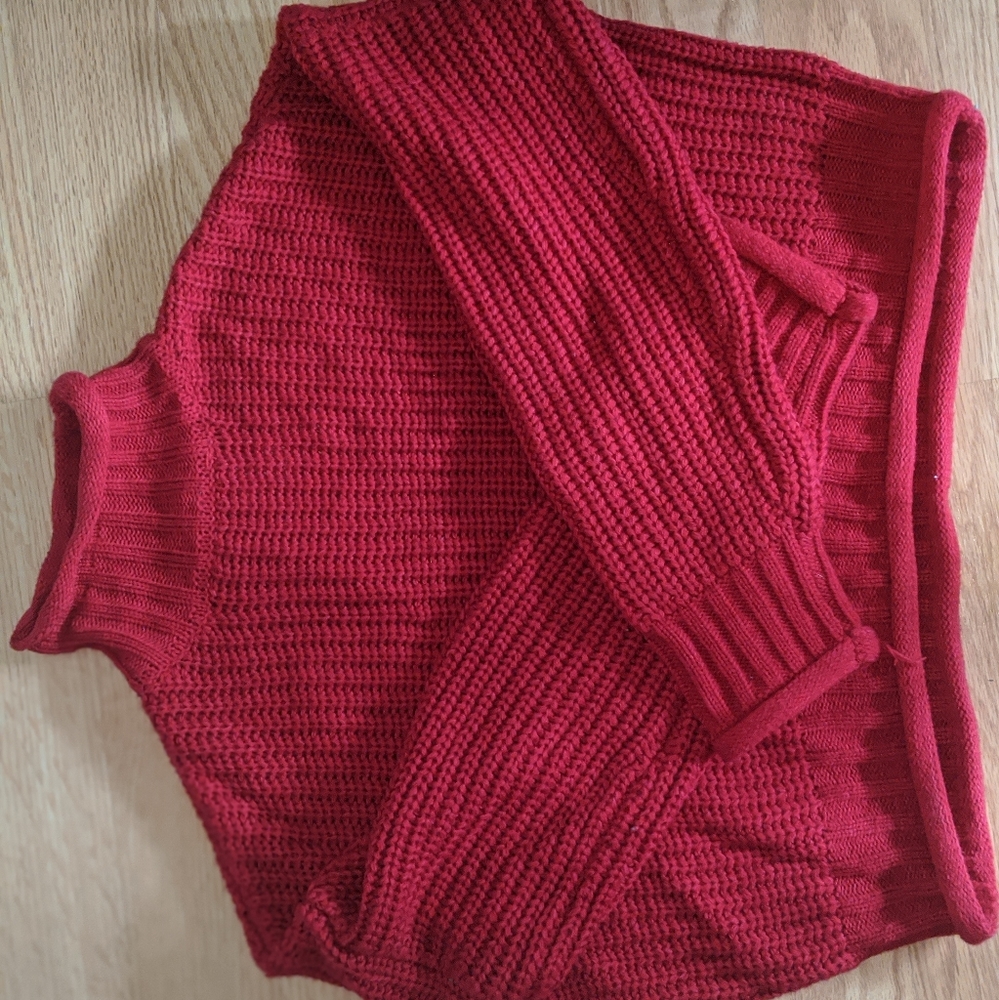 Red knitted turtleneck crop top sweater
